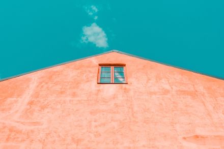 Low-angle Photography of Red Concrete House